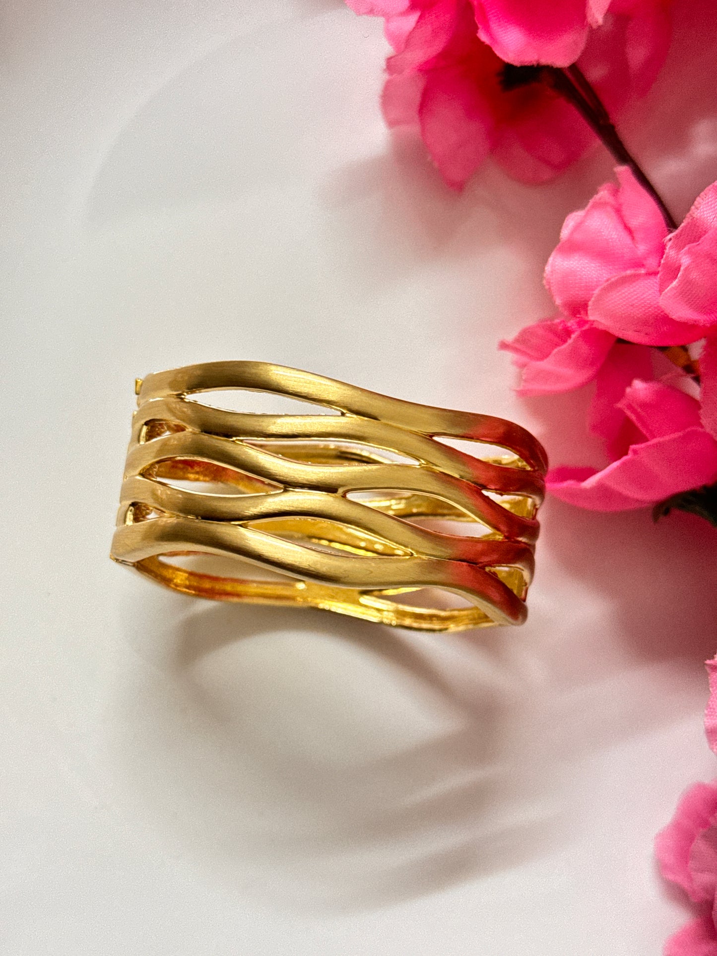 Chunky hollow cutout cuff with frosted metallic shine