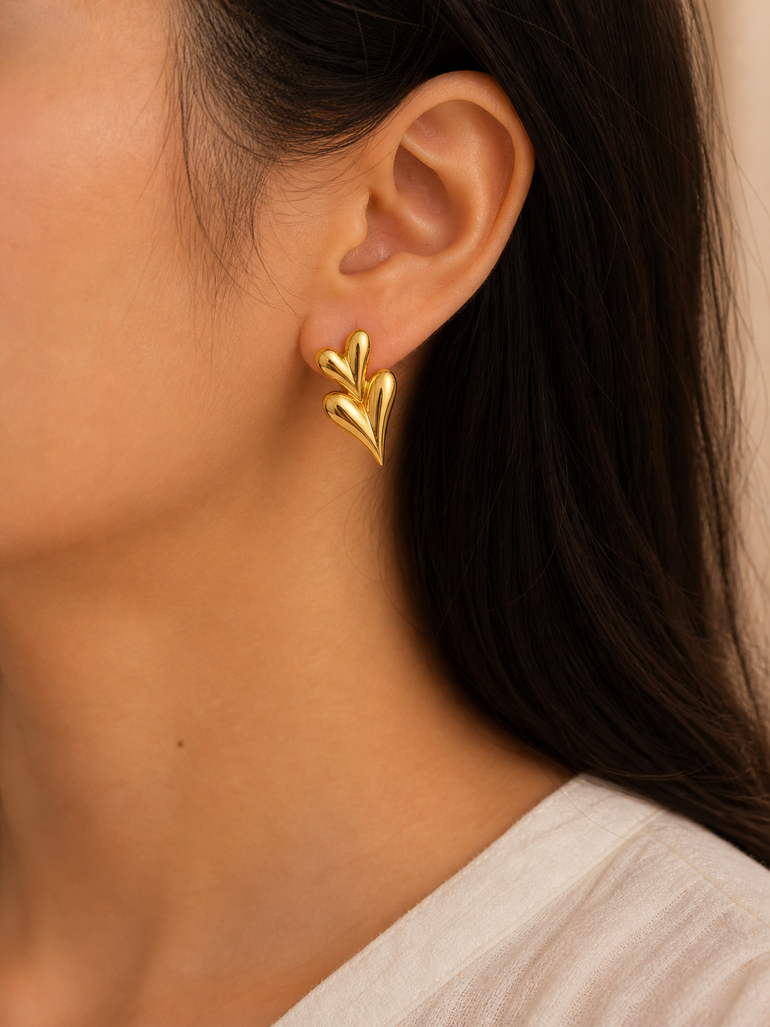 Gold Sculpted Heart Stud Earrings