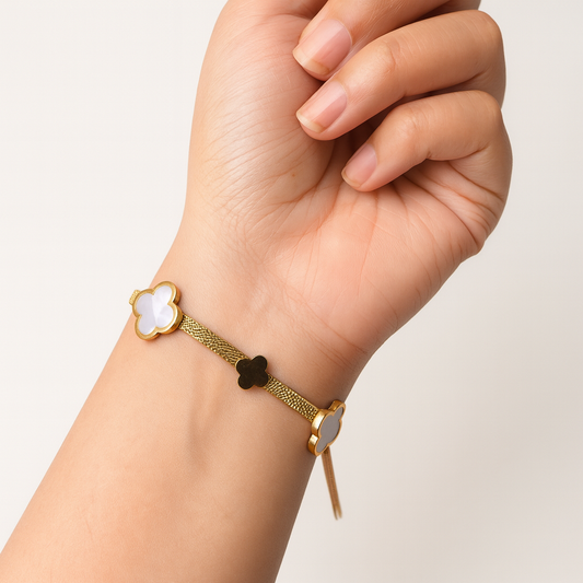 Elegant Gold Clover Bracelet with Black & White Enamel Charms – Adjustable Chain