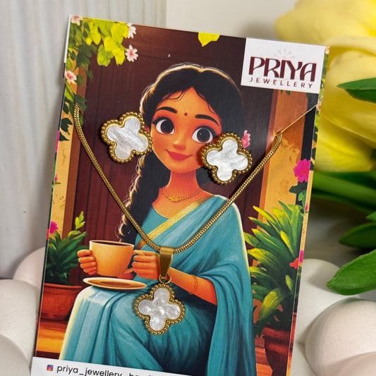 Jewelry card with a design of a woman playing a guitar and earrings, branded 'Priya Jewels'.