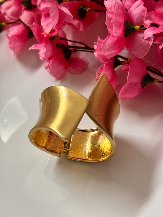Chunky cutout cuff with Frosted metallic shine