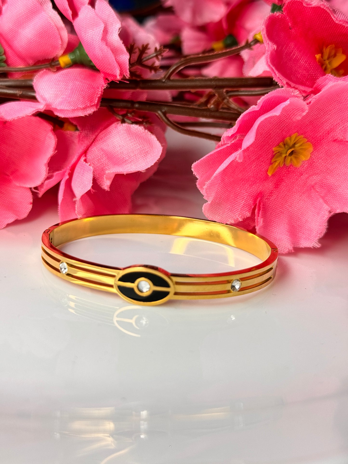 Black Eye Gold Bracelets