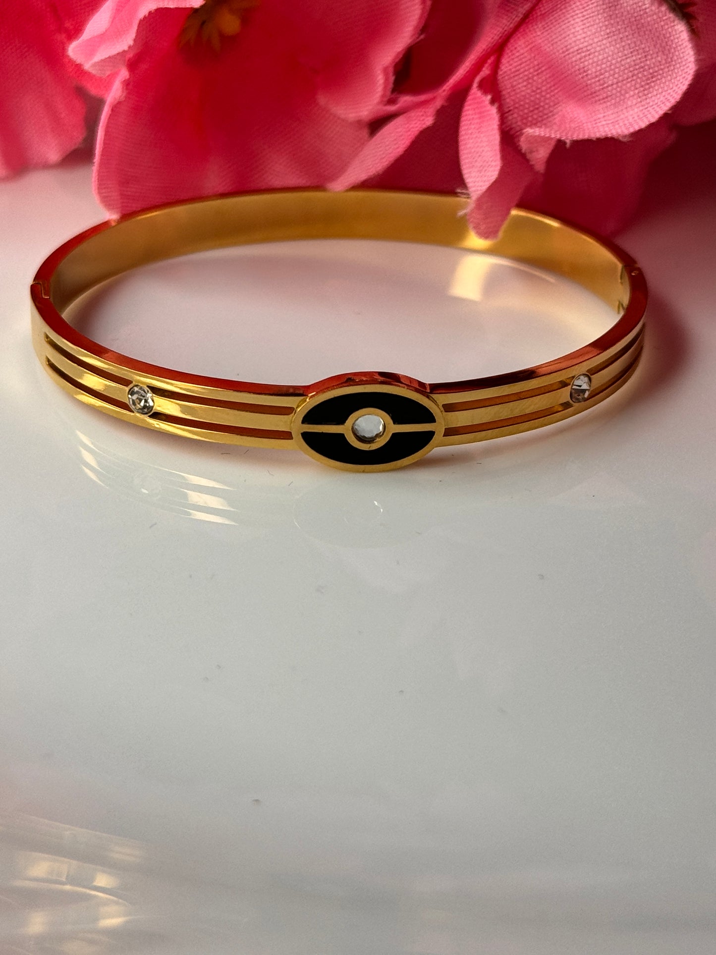 Black Eye Gold Bracelets