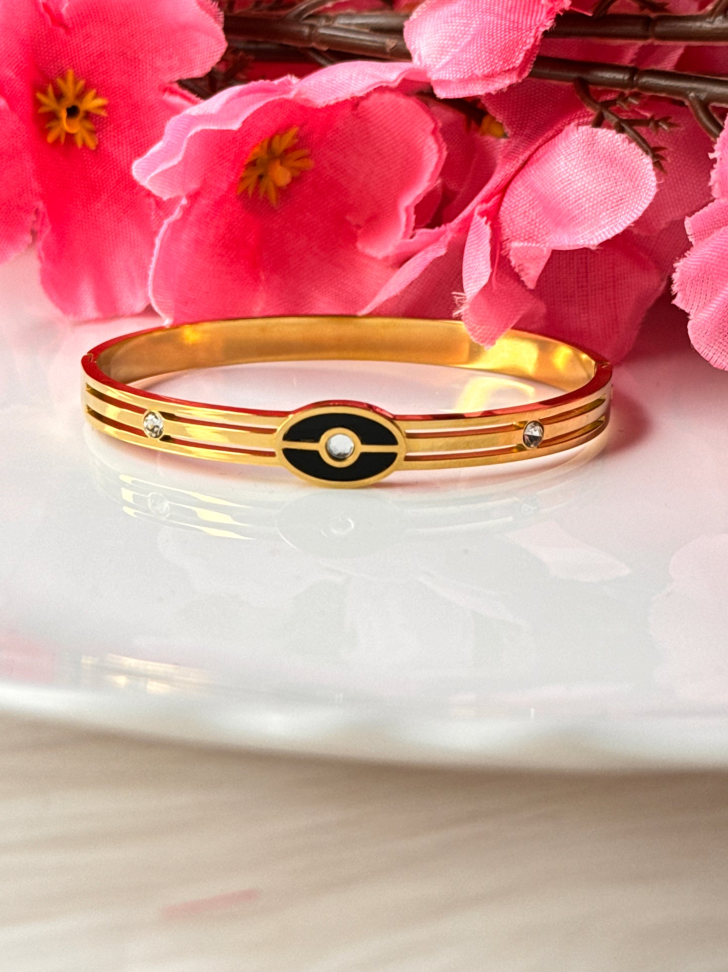 Black Eye Gold Bracelets