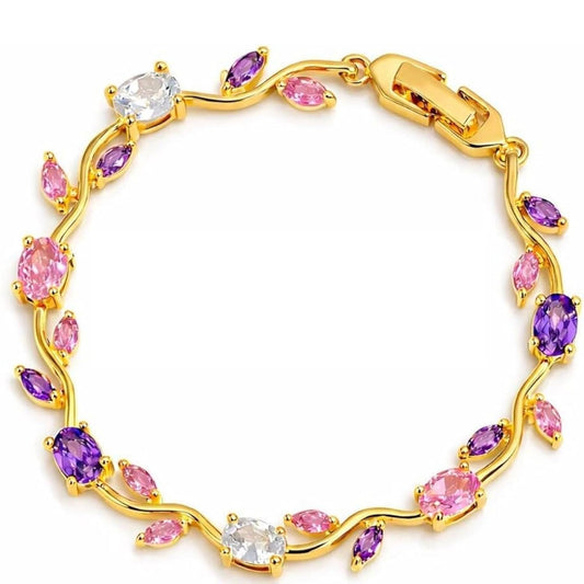 Gold bracelet with colorful gemstones on a white background