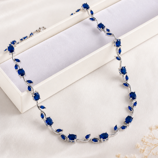 Necklace with blue stones on a white surface
