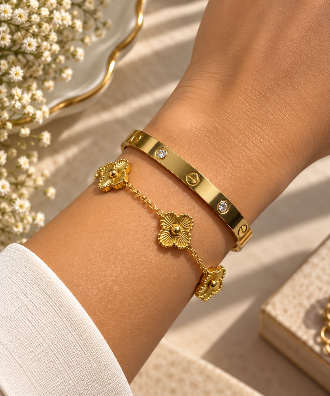 Clover bracelet stack with cartier